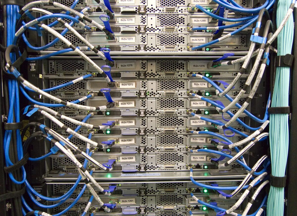 Cabling running through a rack of servers