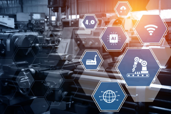 Factory machinery overlaid with connected industry icons